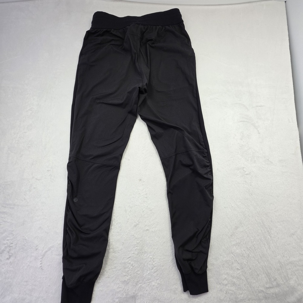 Lululemon Womens Jogger Pants Black Stretch Athletic Drawstring Tapered Size 6 - Picture 8 of 11